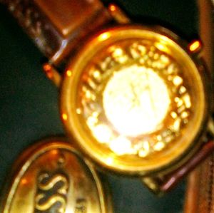 Gold Guess watch
